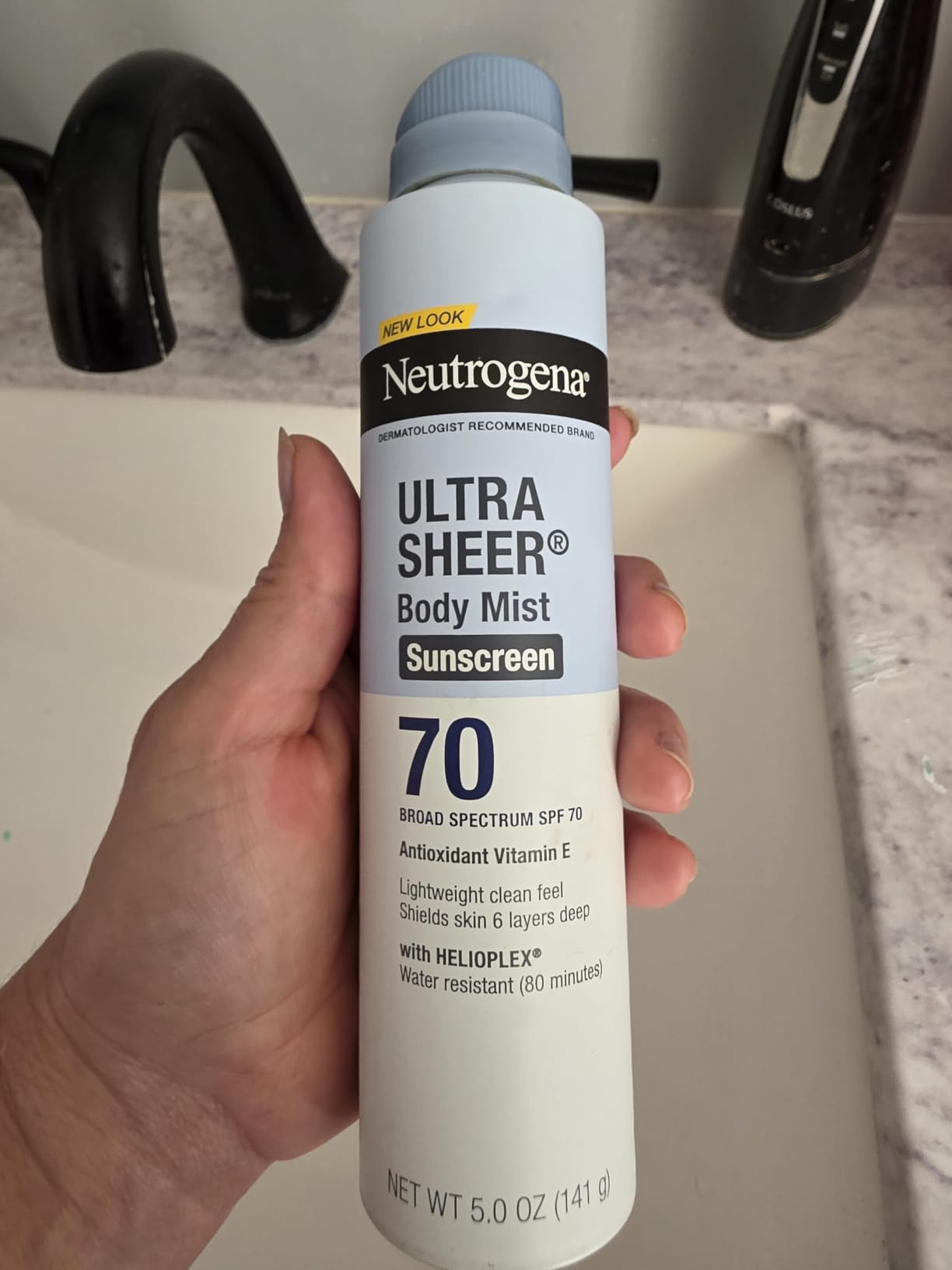 Neutrogena Ultra Sheer Dry Touch Sunscreen Spray, SPF 70, 3 x 5 oz | Broad Spectrum UVA/UVB Protection, Lightweight Spray, Water-Resistant up to 80 Minutes, PABA-, & Oxybenzone-Free customer photo 1