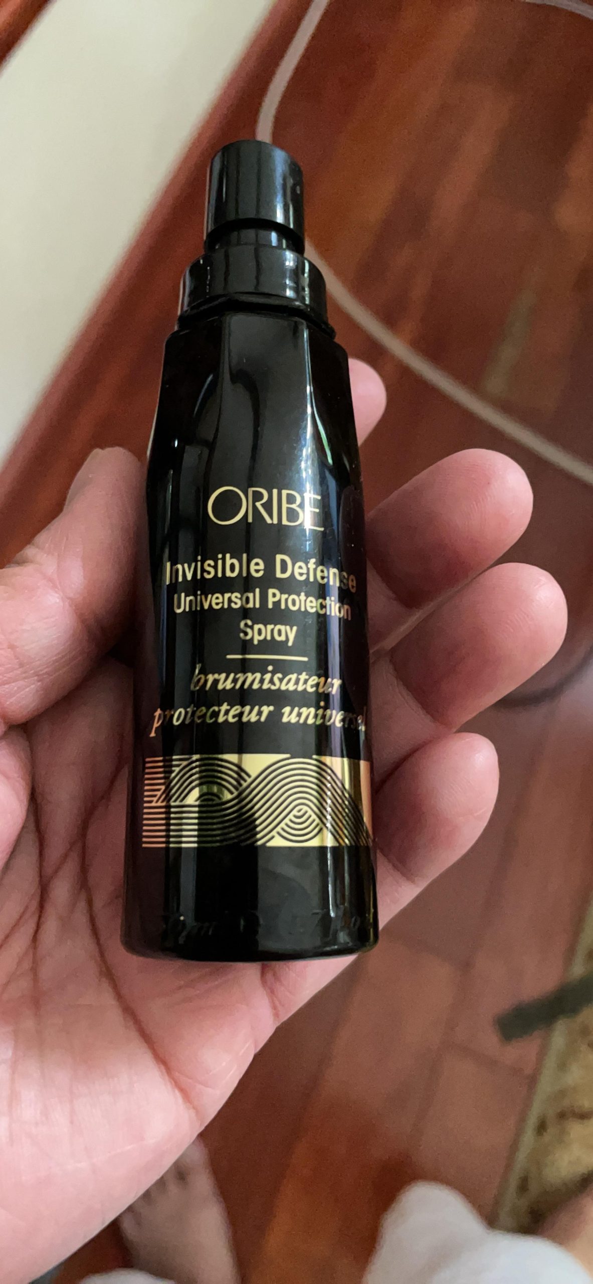 Oribe Invisible Defense Universal Protection Spray - Protects Hair - 5.9oz | 450F Heat Protectant - Protects Hair From Heat Styling, UV Rays & Pollution Damage - Hydrates, Prevents Frizz & Color Fading customer photo 1