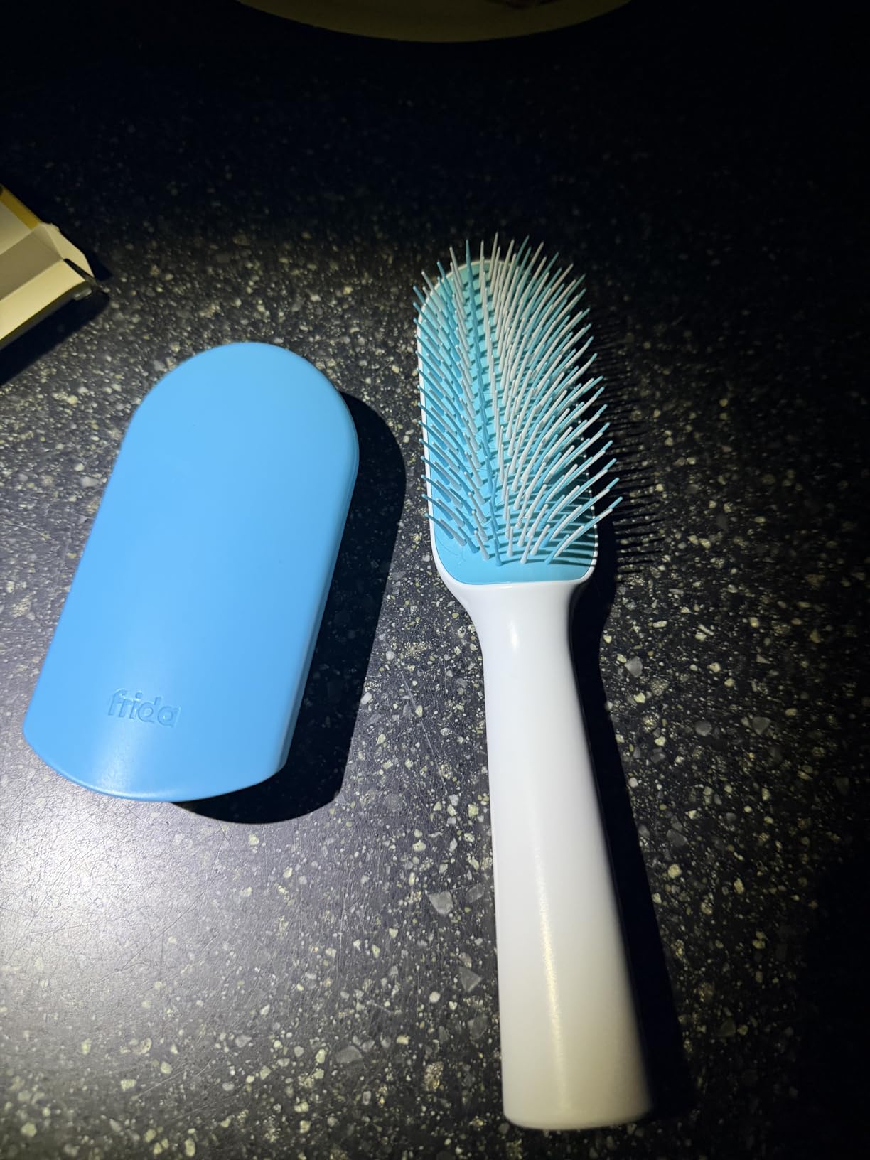 Frida Baby Detangling Hairbrush for Thick or Curly Hair, Toddler Hairbrush, Detangler Brush for Kids, Wide-Tooth Comb & Bristle Combo, Loosens Knots Without Tears or Breakage, Wet or Dry Use, Teal customer photo 1