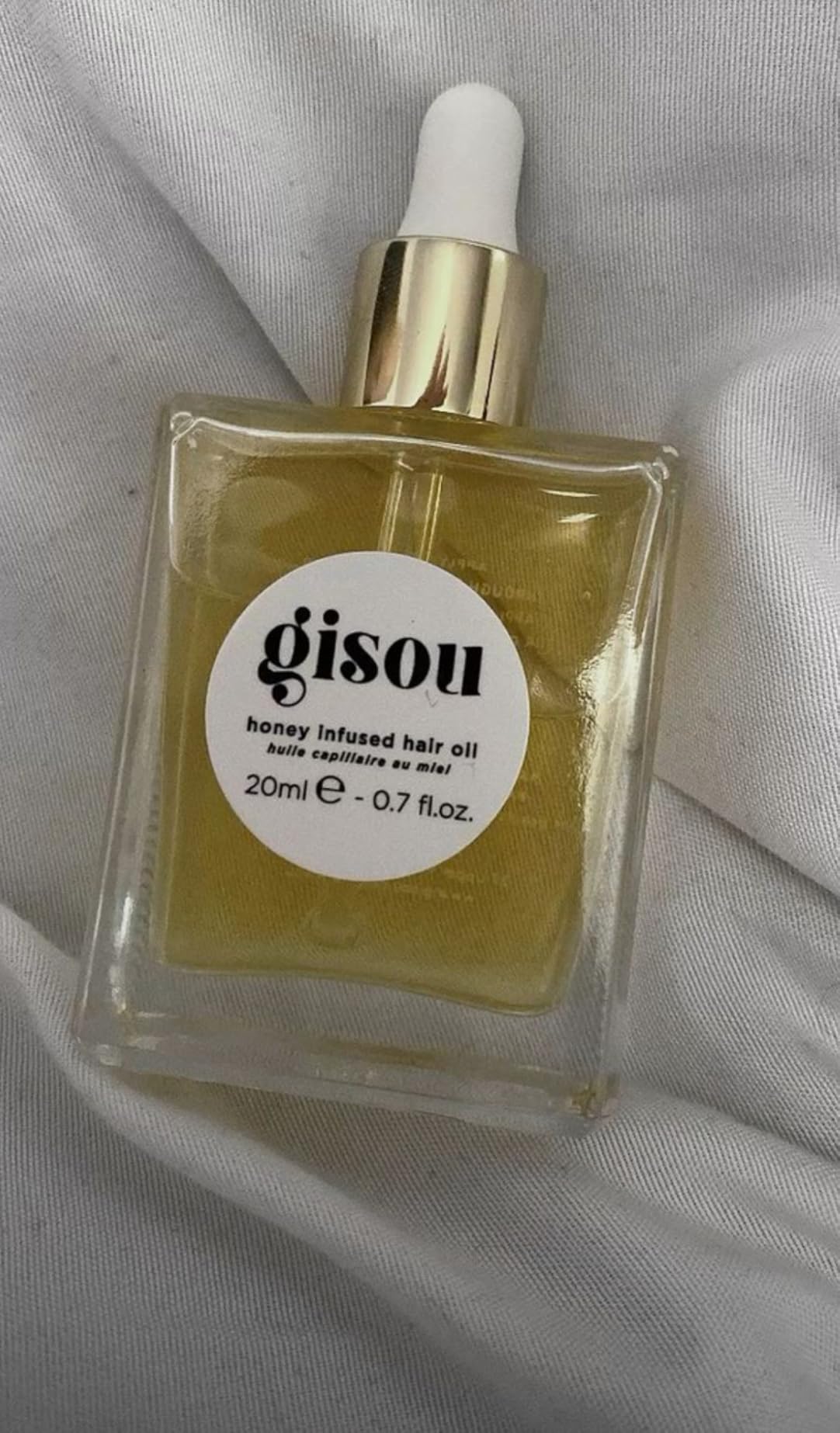 Gisou Honey Infused Hair Oil (1.7 Fl Oz) | Intense hydration, long-lasting frizz control, up to 450°F heat protection, glossy shine, suitable for all hair types customer photo 2