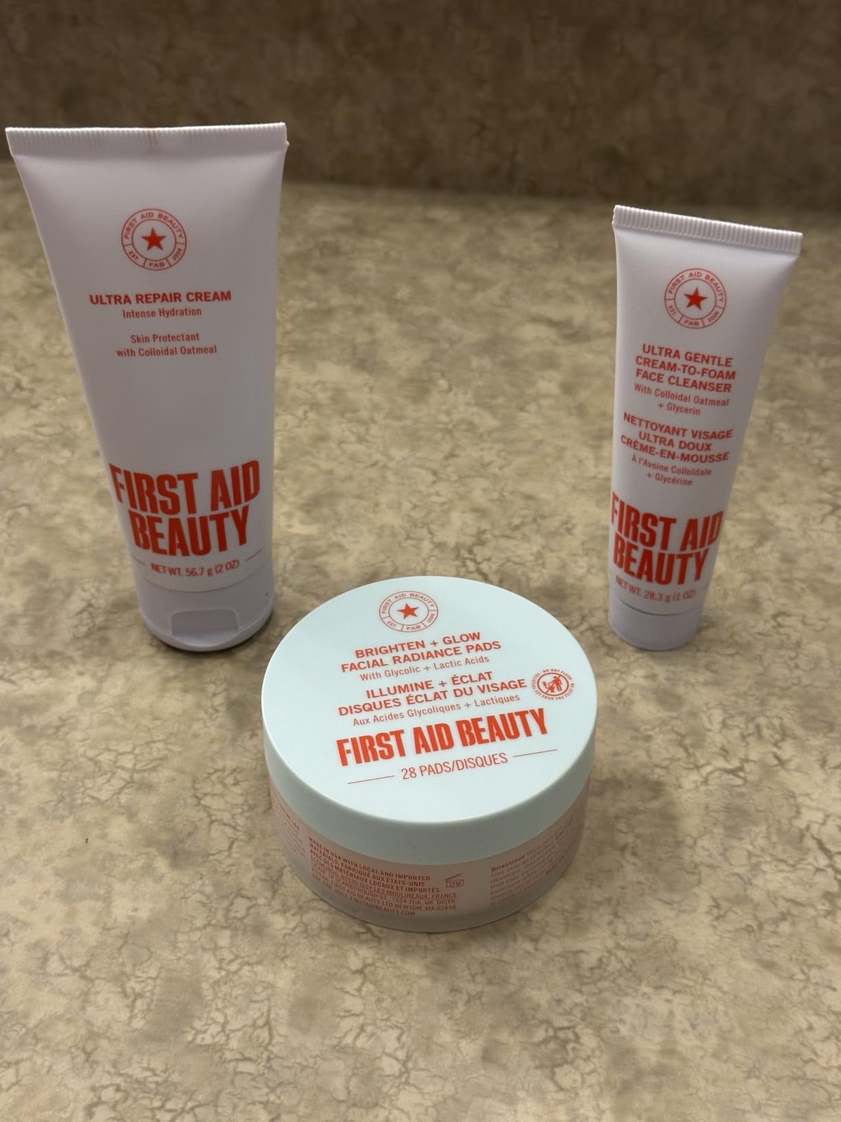 First Aid Beauty Sensitive Skin Skincare Routine Set, Ultra Gentle Cleanser + Facial Radiance Pads + Ultra Repair Cream, Fragrance Free Hydrating & Exfoliating Travel Kit, 3-Piece Gift Set customer photo 1