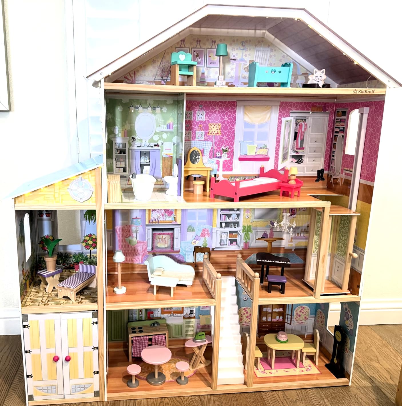 KidKraft Majestic Mansion Wooden Dollhouse with 34 Pieces, Working Elevator | 4 Feet Tall, Garage, 4 Floors, 8 Rooms, Attic Nursery, For Dolls Up to 12 Inches, Gift for Ages 3+ customer photo 2