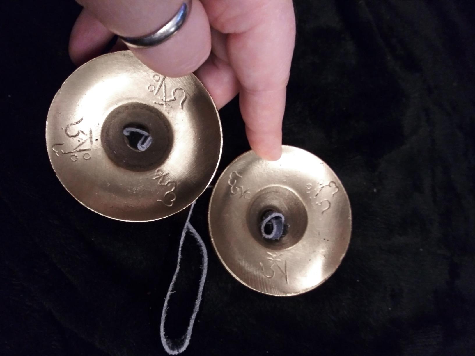 Dharma Store - Tibetan Tingsha Cymbals - 6.2 cm - OM Mane Padme Hum Symbols Embossed customer photo 1