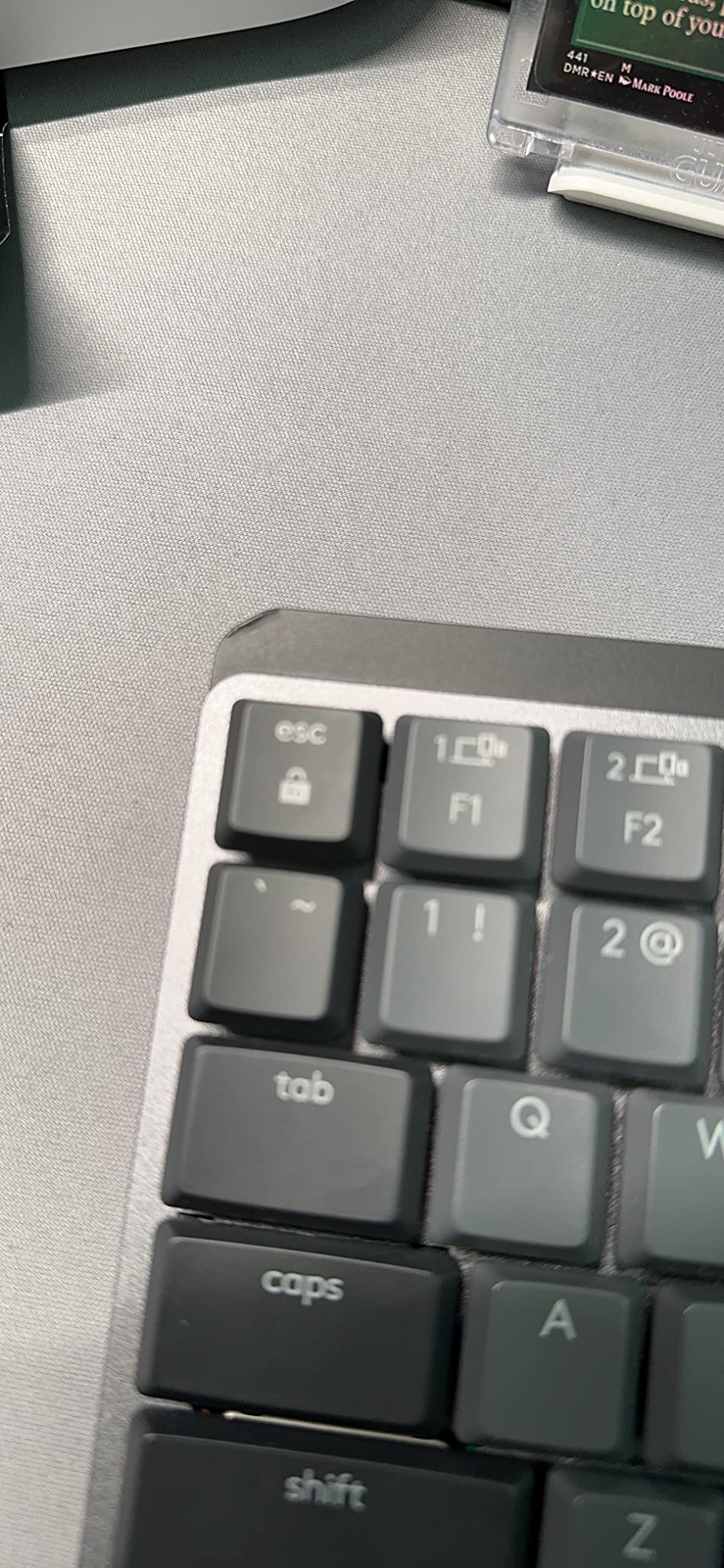 Logitech MX Mechanical Mini Mac Wireless Keyboard Low-Profile - Pale Grey | Low-profile full-size, 3 device Bluetooth pairing, Smart backlight auto-adjusts, USB-C rechargeable, Up to 15 day battery customer photo 2