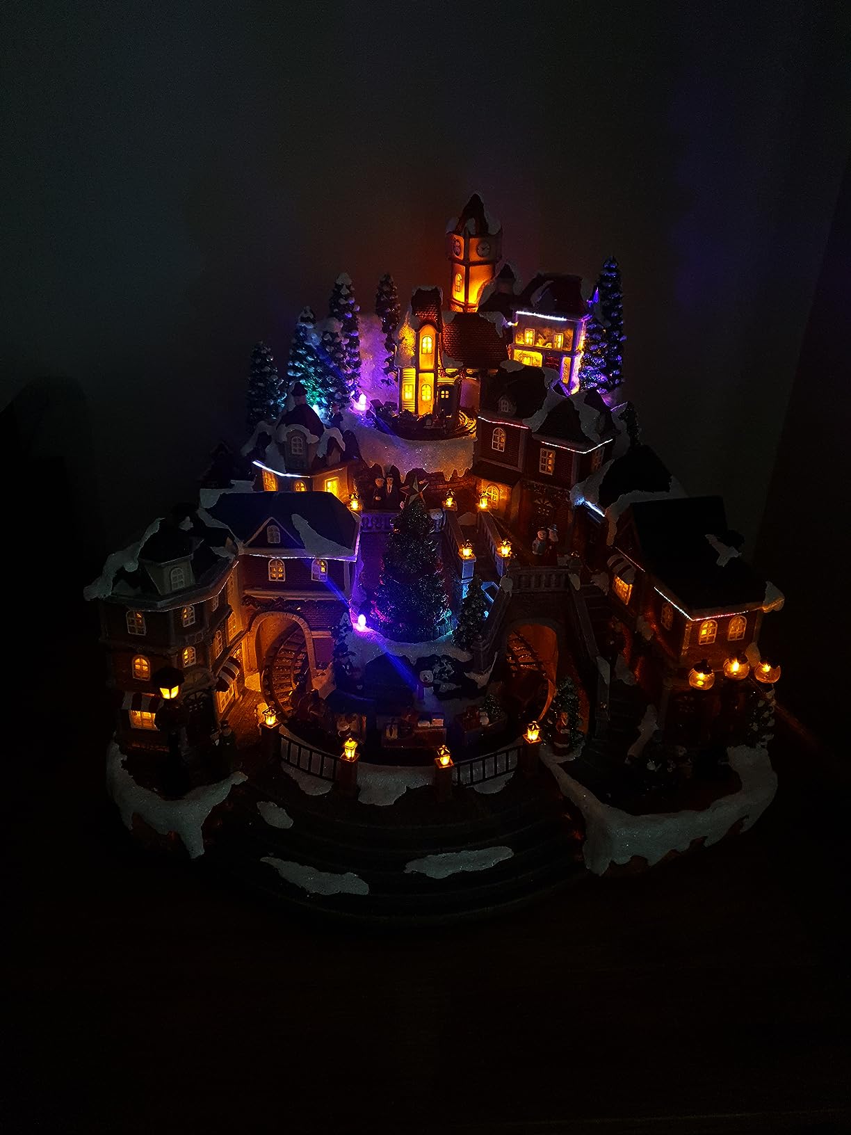 MOMENTS IN TIME Animated Christmas Village Scene with Rotating Train LED Lighted Houses Snow Covered Town Display Holiday Tabletop Decor with Christmas Tree and Figurines customer photo 2