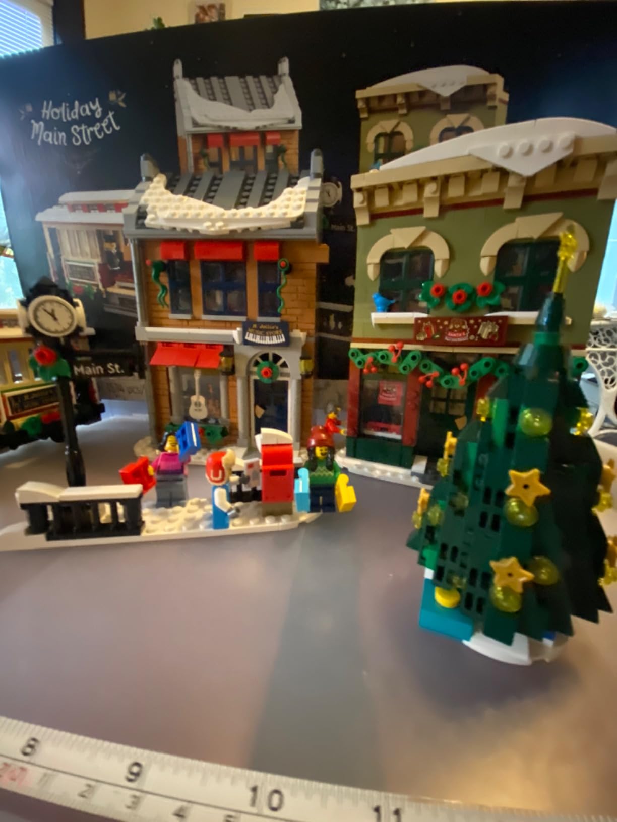 LEGO Holiday Main Street Building Kit, Christmas Village Adult Set for Families, Holiday Display Set with Shops, Streetcar and 6 Minifigures, Christmas Decoration to Build Together, 10308 customer photo 1
