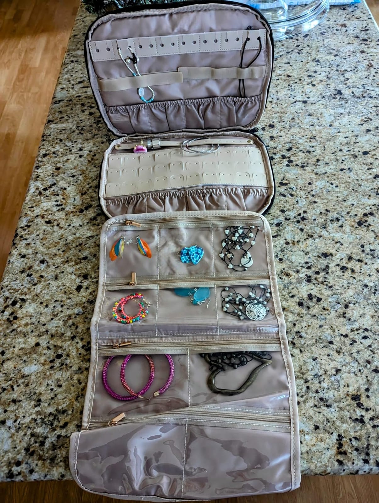 BAGSMART Jewelry Travel Case, Hanging Jewelry Organizer with Zipper Pockets, Large Capacity Puffy Jewelry Roll for Earrings, Necklaces, Rings on Closet, Wall, Door, Portable Travel Essentials, Black customer photo 1