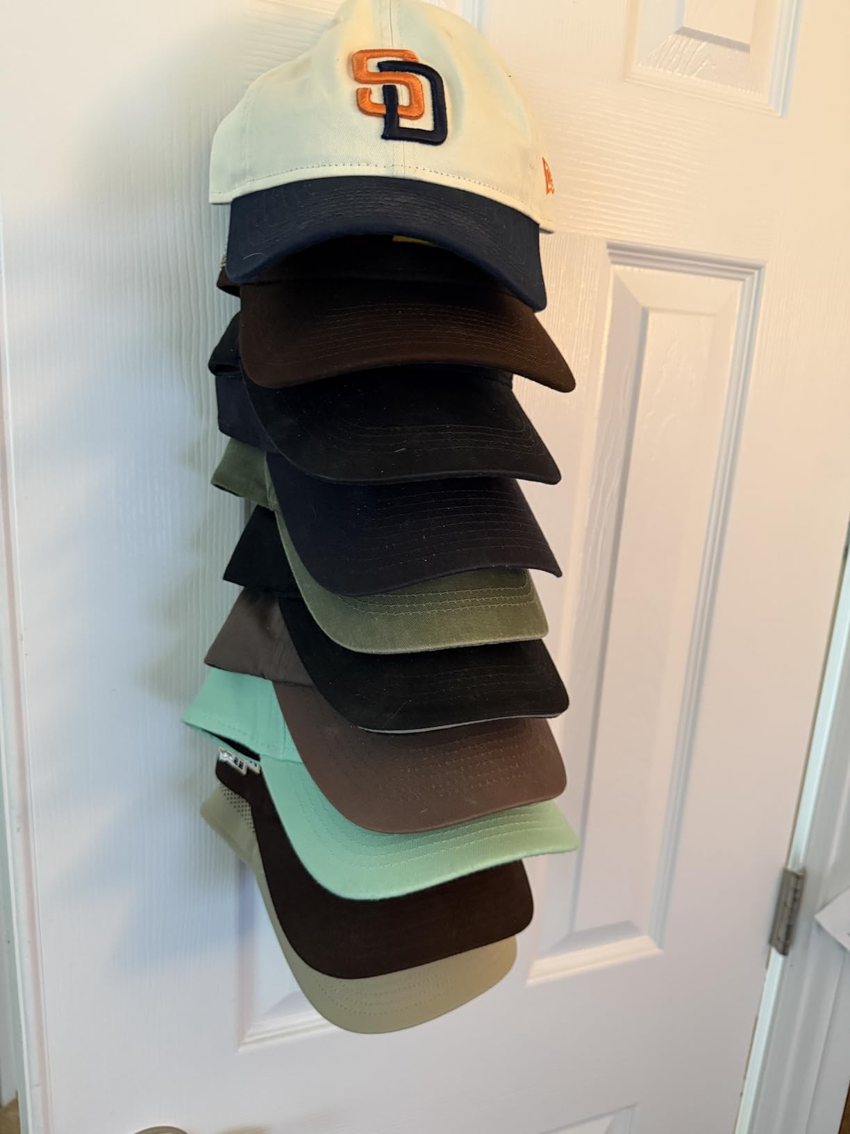 Hat Organizer for Baseball Caps Hold Up to 40 Hats, 2 Pack Hat Rack for Wall, Strong Adhesive Hat Storage Display Holder for Closet Door and Wall (Black) customer photo 1