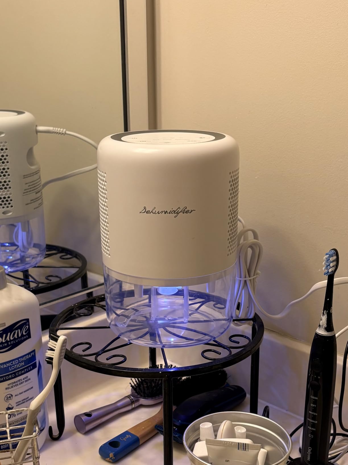 44oz(1.3L) Small Dehumidifier for Home Auto-Off Quiet Portable Dehumidifier with 3 Modes 10 Color Lights 4 Timer Settings for Bedroom Bathroom Closet (215 sq.ft) customer photo 2