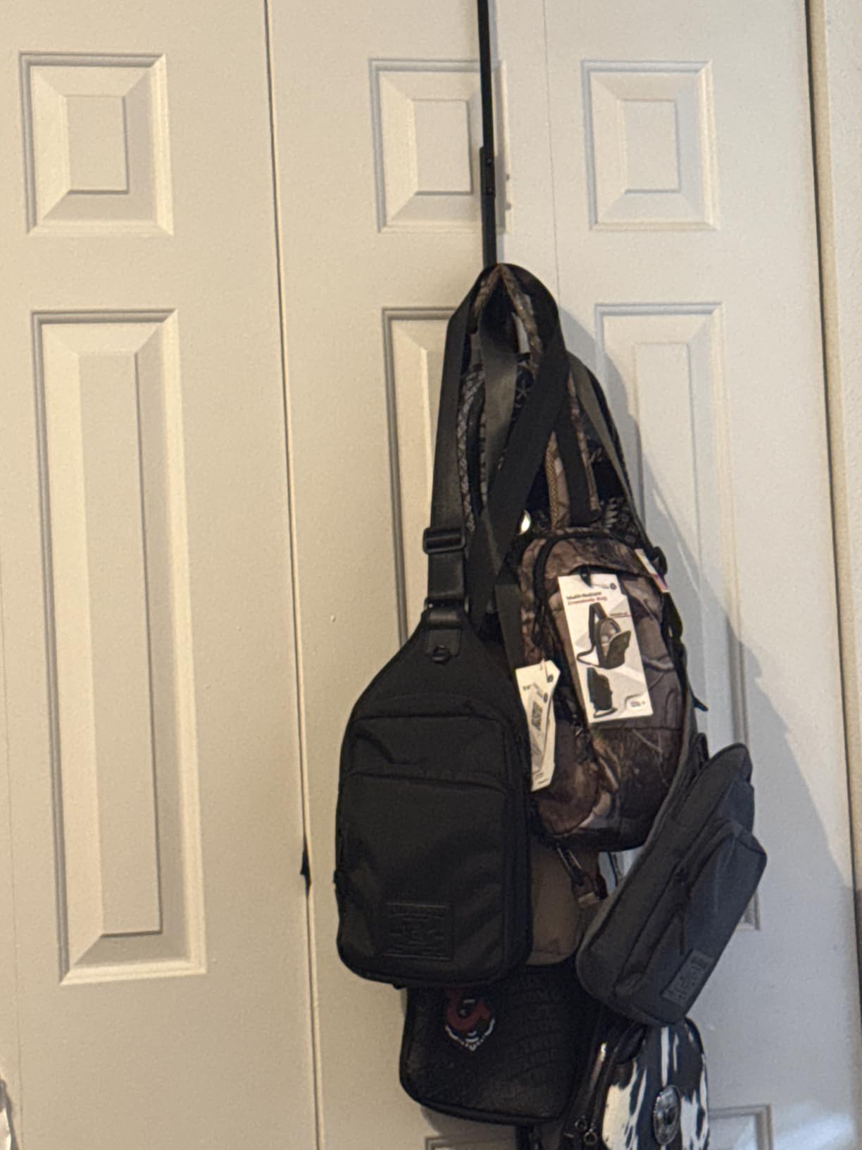 SWTYMIKI Over the Door Purse Organizer - 2 Packs Wall Mounted Purse Rack with 8 Hooks Design, Holds up to 16 Bags, Black customer photo 1