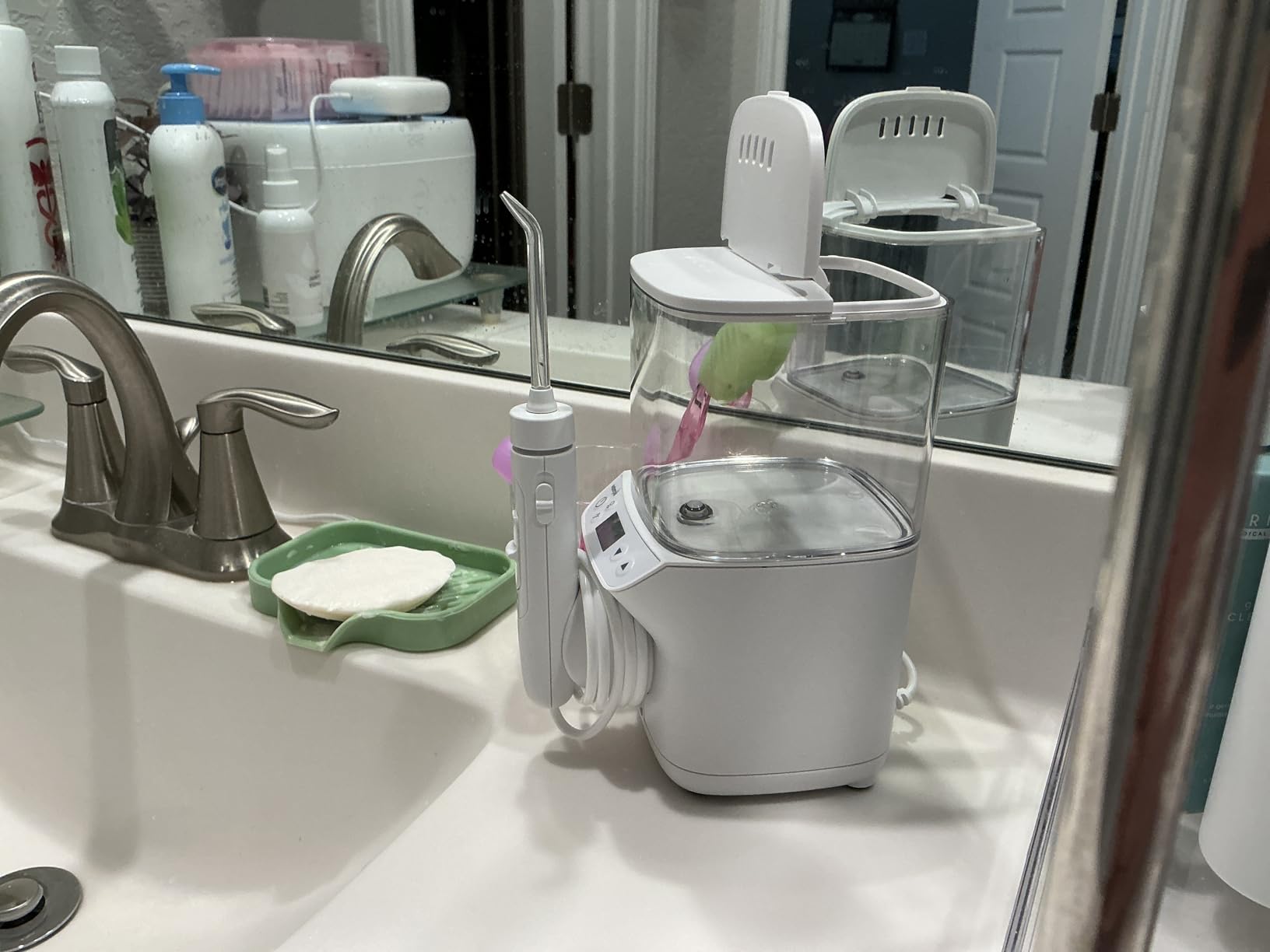 Waterpik Promax Water Flosser with SmartAdvance Mode for Daily Gum Health and Cleaning Teeth, Braces, Implants, ADA Accepted, Small Quiet Design, Electric Flosser with 10 Settings, 5 Tips, WF-23 customer photo 2