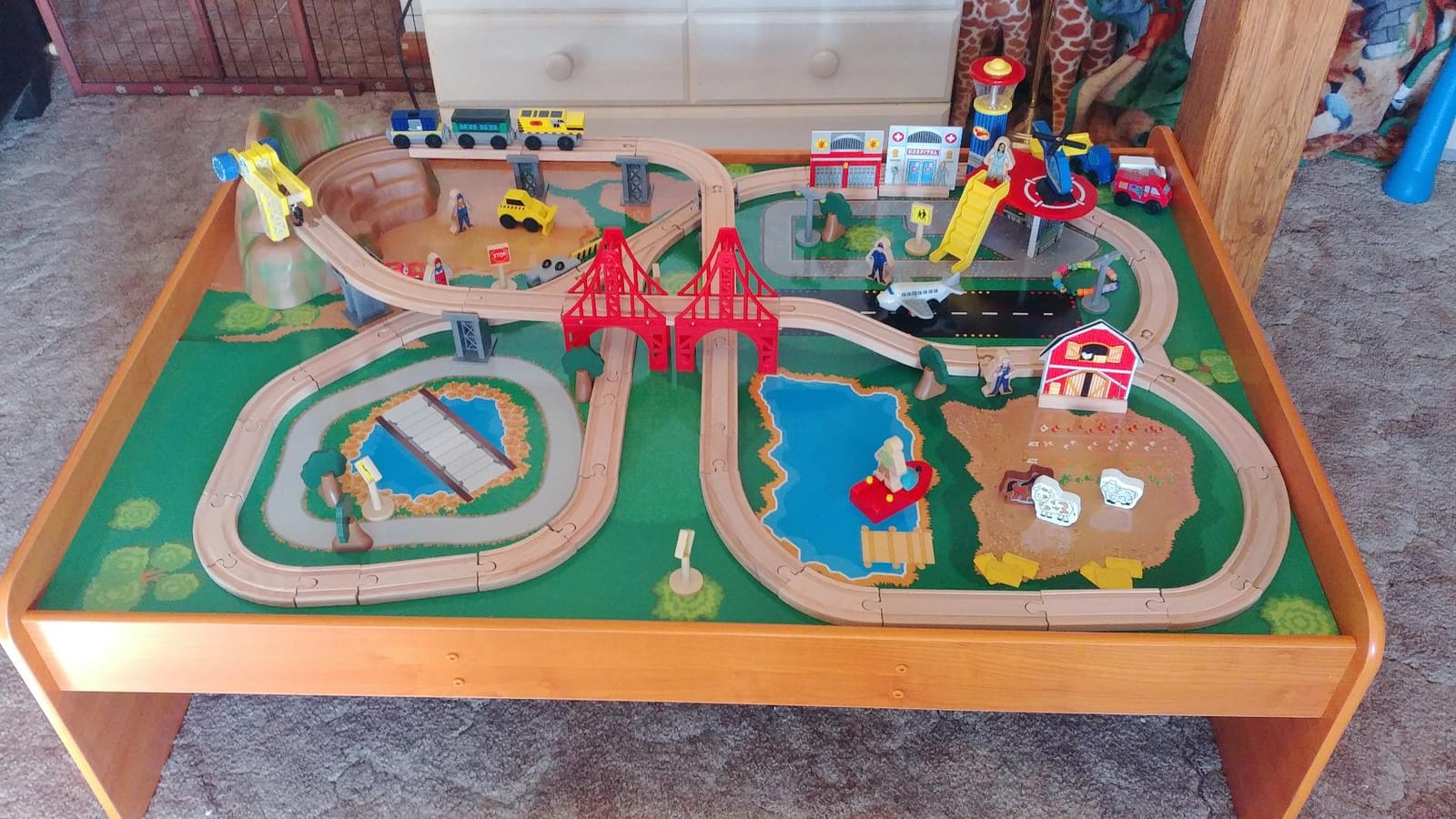 KidKraft Ride Around Town Wooden Train Set and Table with Helicopter, Airplane, Farm, Storage Bins and 100 Pieces, Compatible with Other Major Brand Trains, Honey customer photo 1