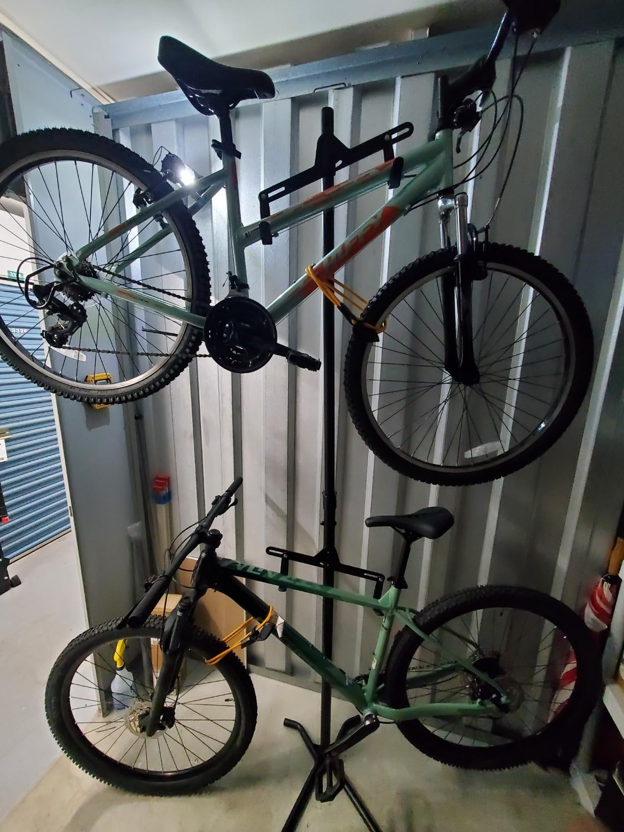 CyclingDeal 2 Bike Bicycle Vertical Hanger Parking Rack Gravity Floor Storage Stand for Garages or Apartments customer photo 1