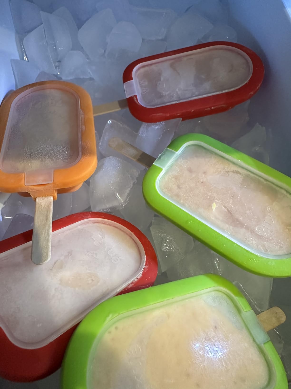 Lékué Set of 4 Stackable Popsicle Molds + Sticks & Lids | Homemade Freezer Ice Pops & Frozen Snacks | Flexible Platinum Silicone for Easy Fill & Unmold | Reusable & Dishwasher Safe| Multicolor customer photo 1