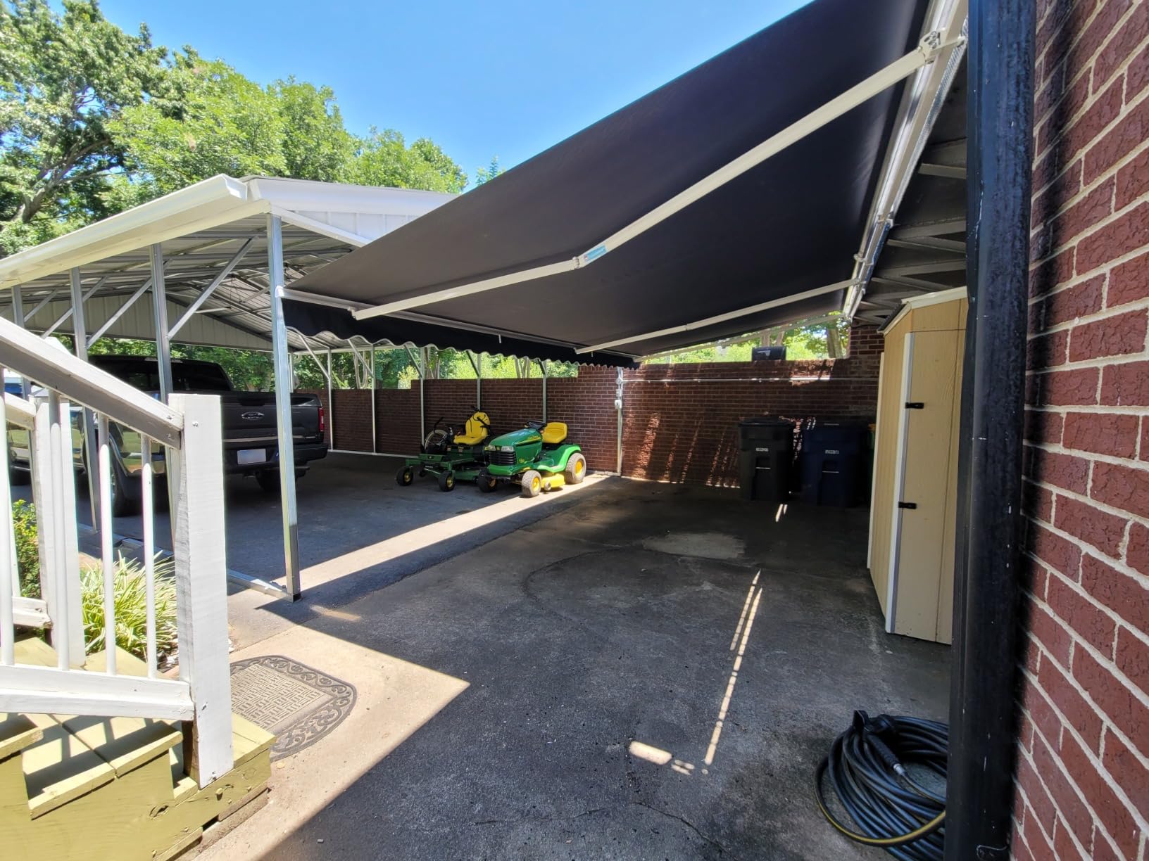 ALEKO 20x10 ft Electric Retractable Patio Awning, Remote Control Motorized & Manual Crank, Outdoor Shade Canopy with UV-Resistant Fabric - White Frame, Gray | Retractable sunshade for decks and balconies, remote-controlled extension, water-resistant fabric, rust-free aluminum frame customer photo 1