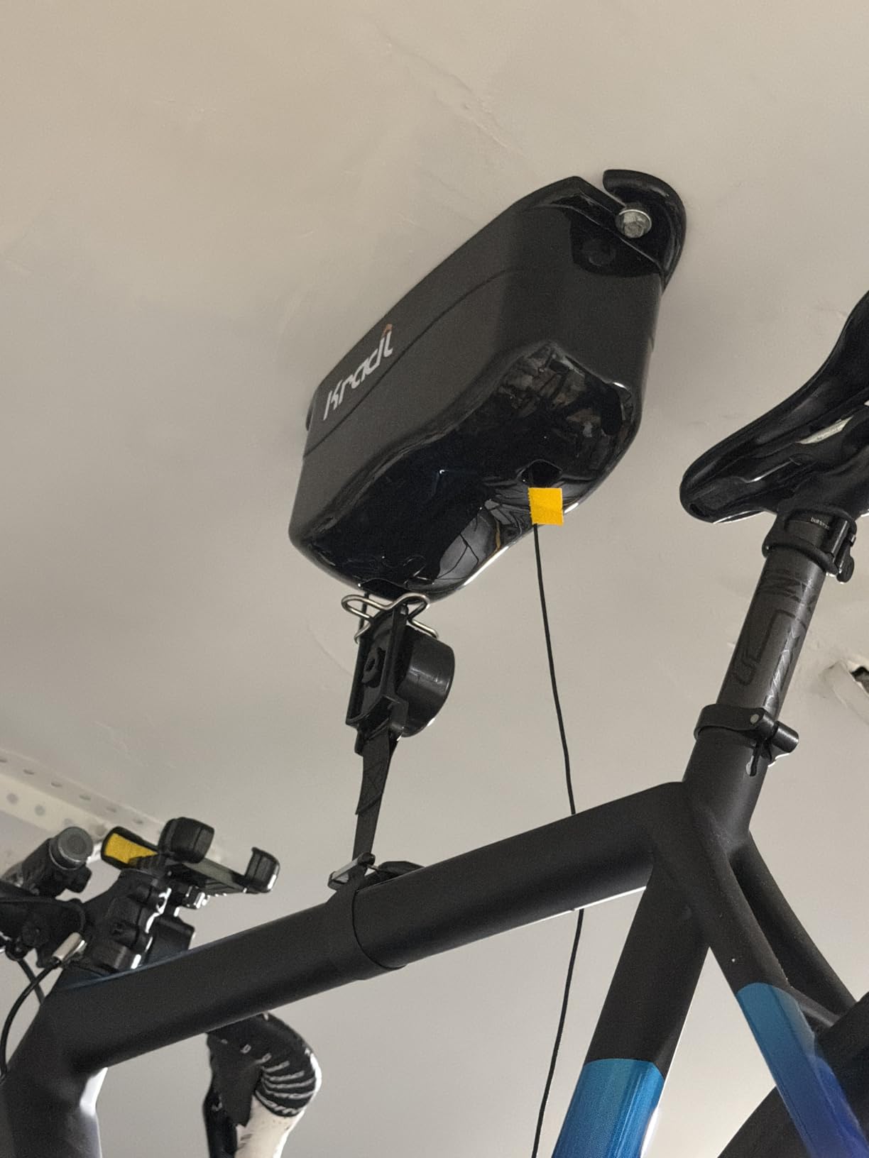 Kradl - Spring-Powered Ceiling Bike Hoist and Rack for Effortless Storage customer photo 1