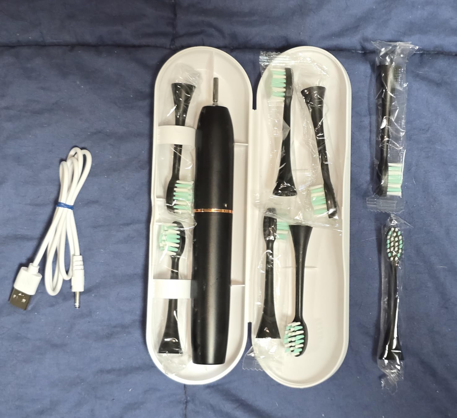 kingheroes Electric Toothbrush Set, Comes with 8 Brush Heads & Travel Case,4 Modes with 2 Minutes Built in Smart Timer, One Charge for 60 Days, 42000 VPM Motor (Black) customer photo 1