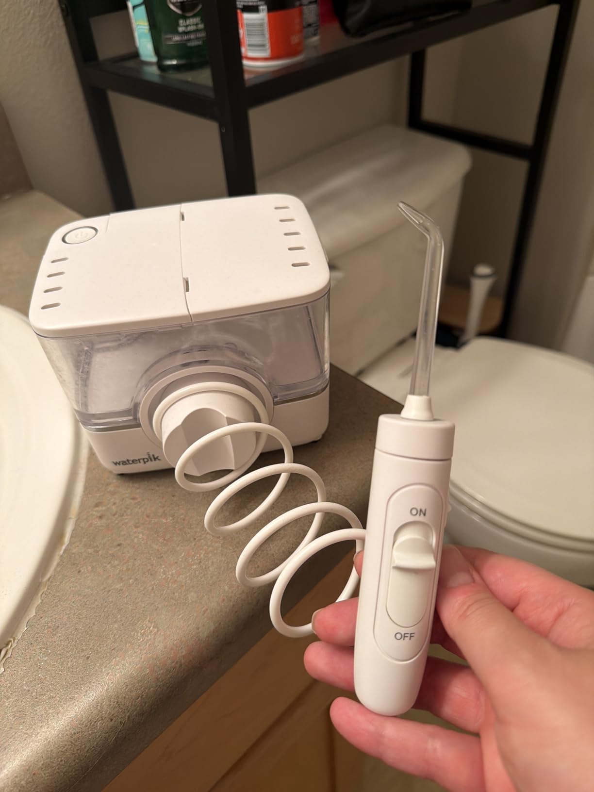 Waterpik ION Rechargeable Water Flosser with 10 Settings, 7 Tips, White customer photo 2