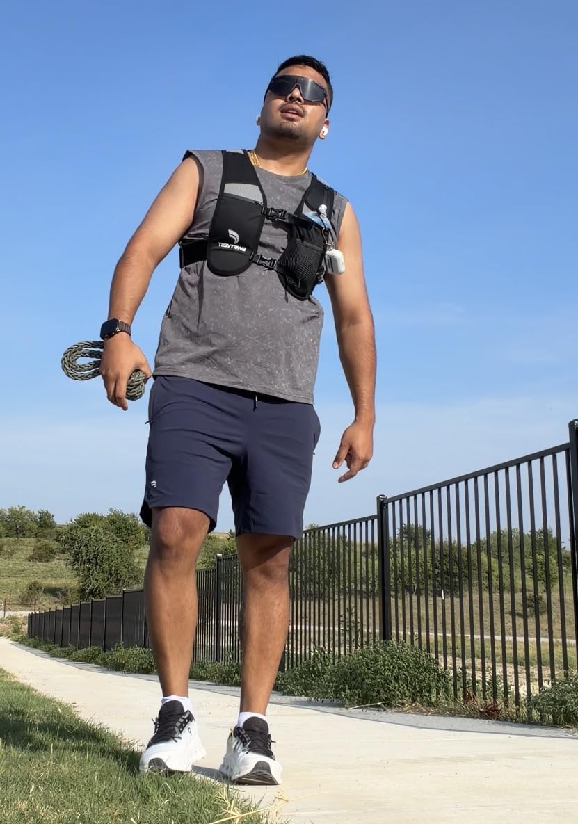 Running Phone Holder Vest with 500ml/17oz Water Bottle | Reflective Hydration Vest | Adjustable | Light | 6 Pockets for Running Accessories | Unisex customer photo 1